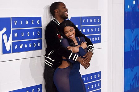 Nicki Minaj pours her curves into skin-tight floral dress for date night  with Meek Mill ahead of VMAs - Mirror Online