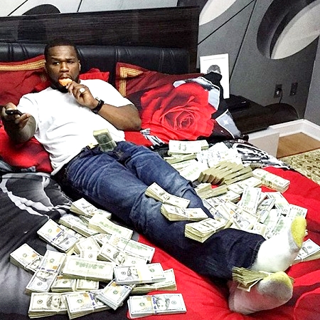 Too Much Money! 50 Cent Flaunts Bundles of Dollars to Silence Critics ...