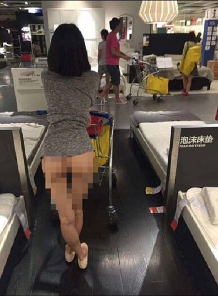 Unbelievable! Chinese Woman Causes Uproar by Going to Shopping Mall Wearing  'No Panties' (Photos)