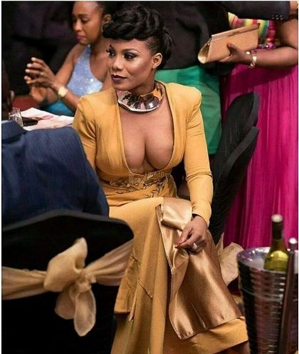 Ghanaian Actress Wears Dress Leaving Her Breasts Almost Popping Out (Photos)
