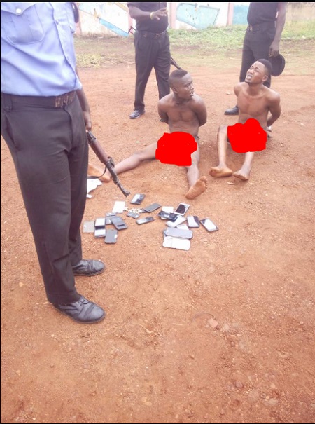 Two Suspected Phone Thieves Stripped Unclad After Being Caught With Phones In Ogun Photos