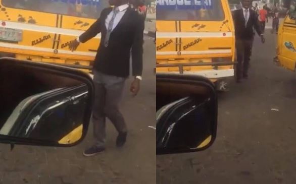 Bus conductor in suit