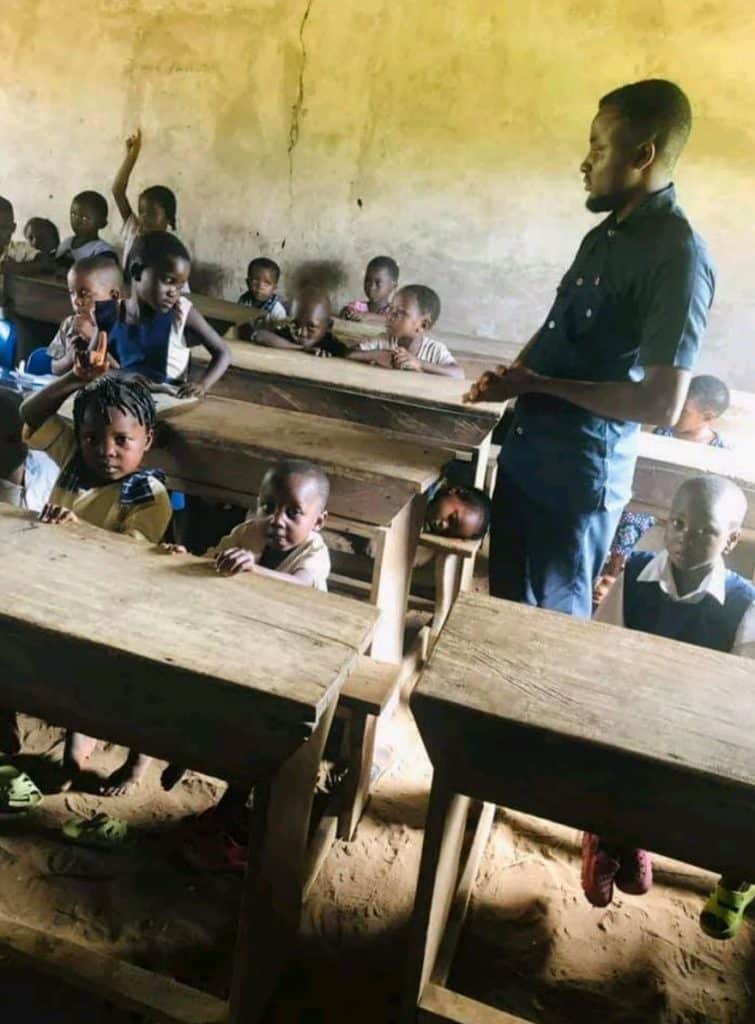 Primary school where students learn under thatch hut