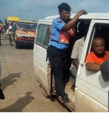 Nigerian police woman becomes bus conductor because of bribe