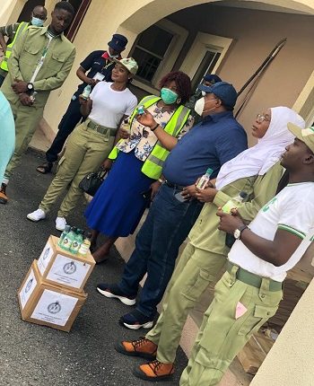 Corps members donate hand sanitizer and other disinfectant materials to Kwara government