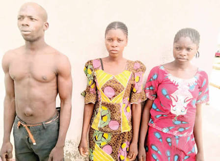 The sisters and the motorcyclist after they were arrested