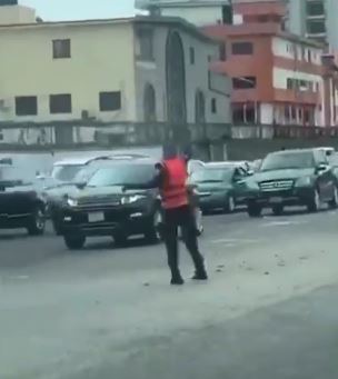 Police officer filmed dancing leg work while controlling traffic