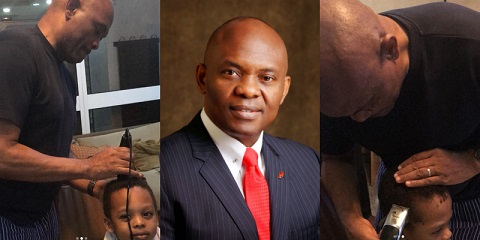 Tony Elumelu showing off barbing skills