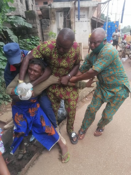 The woman resisted being taken out of the streets with her son