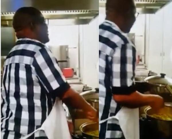 Wike cooking in his kitchen