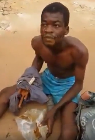 The suspect after he was arrested and forced to eat faeces in Delta