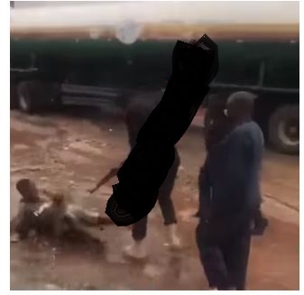 Police officers assaulting a man in Benin