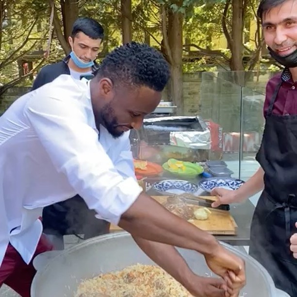 Mikel Obi cooking food for his twin daughters on their birthday