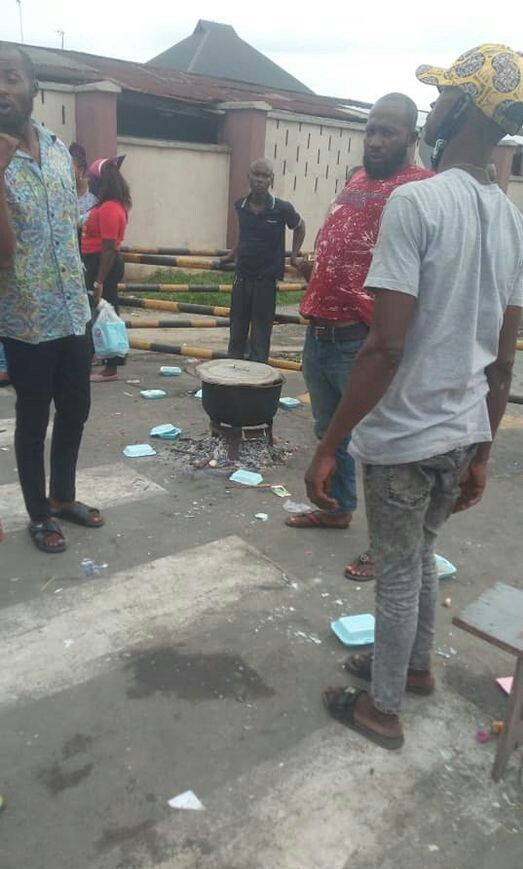 The youths cooked food at the shell premises to protest sack of their kinsmen