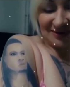 Russian woman inks Flavour N'abania's face on her body