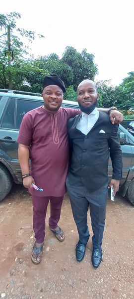 Israel Balogun posing with lawyer, Inibehe Effiong