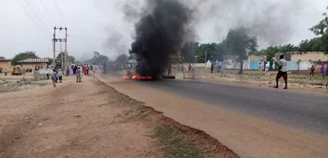 Youths block highway