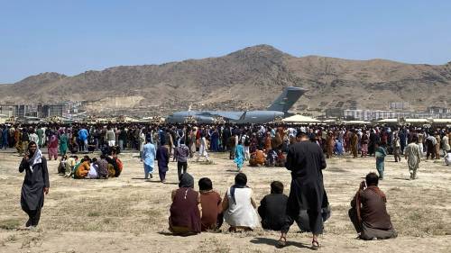 Afghans gather near Kabul airport