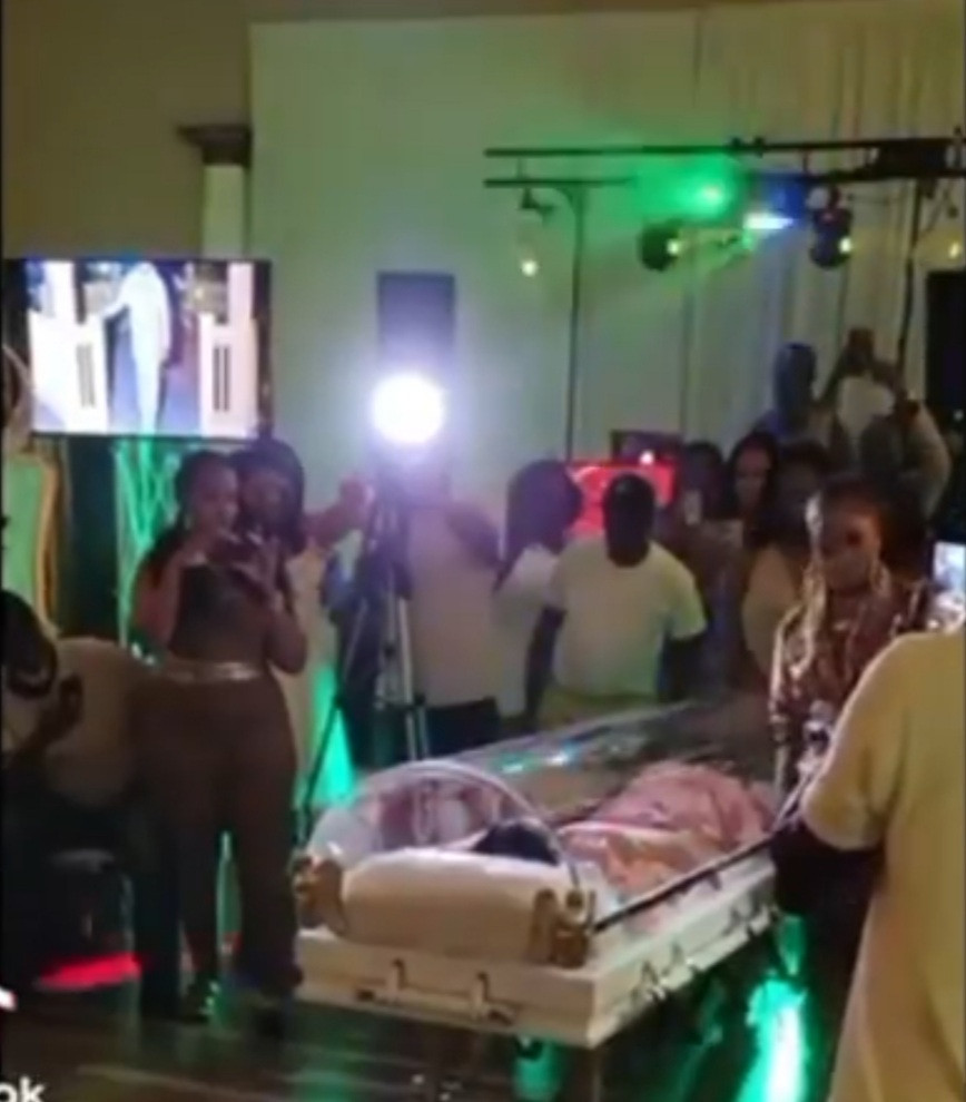 Woman attends her own birthday party inside coffin