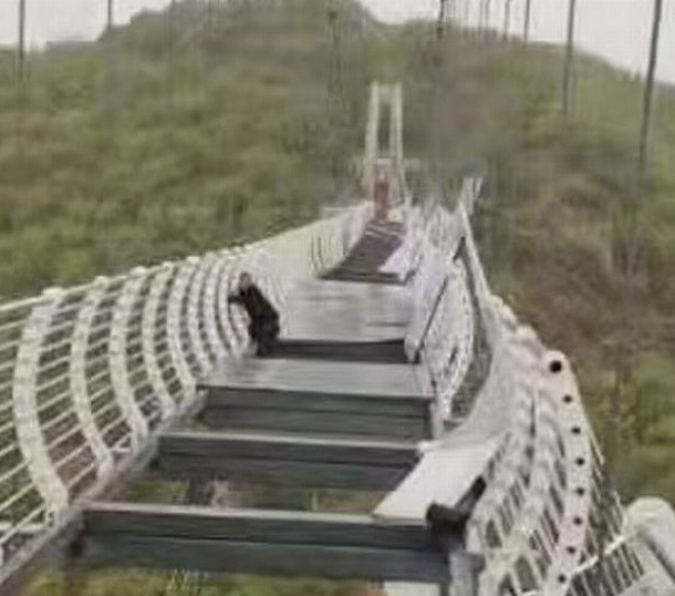 Glass bridge shatters while man was walking on it