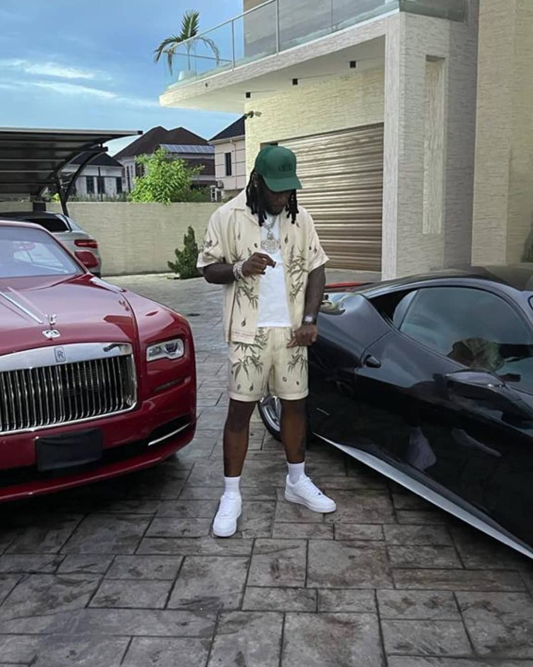 Burna Boy shows off his expensive garage