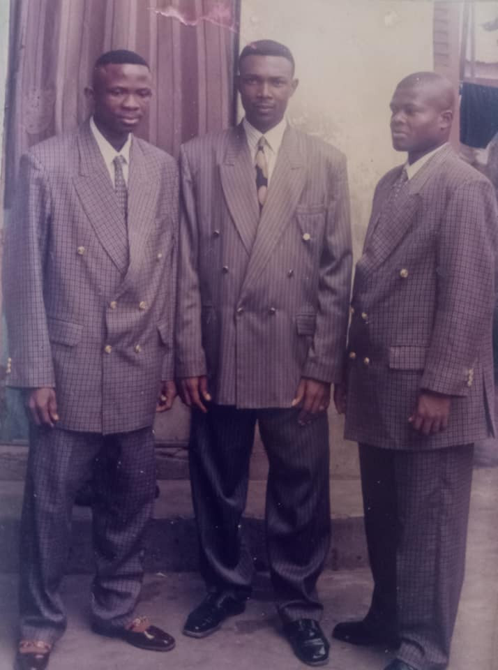 Ogbu and friends wearing coat