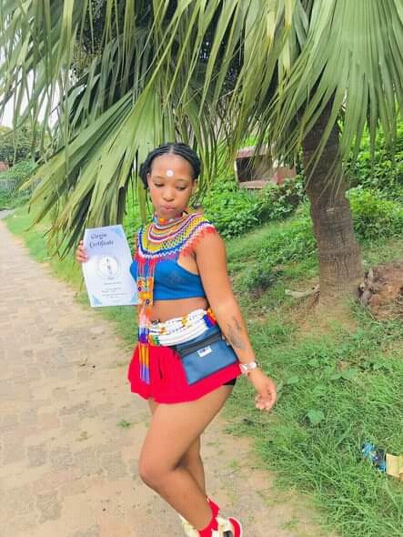 South African Lady Displays Her Certificate Of Virginity Photos 