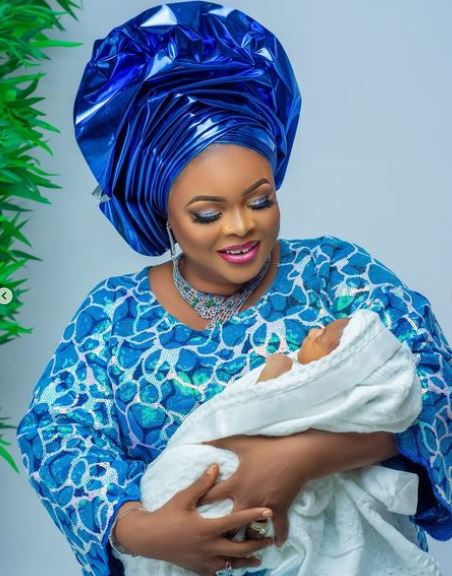 Dayo Amusa and baby