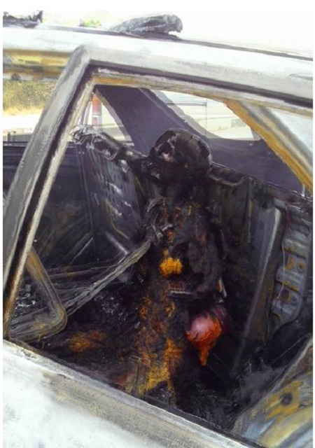 Graphic Photos: Two Burnt to Death in Fatal Road Accident Along Lagos