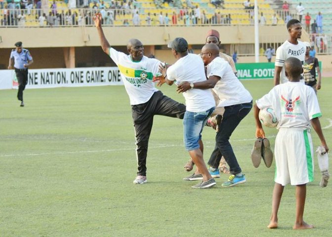 Nigerian Coach Slaps And Kicks His Colleague During Football Match In Kwara  (Photo)